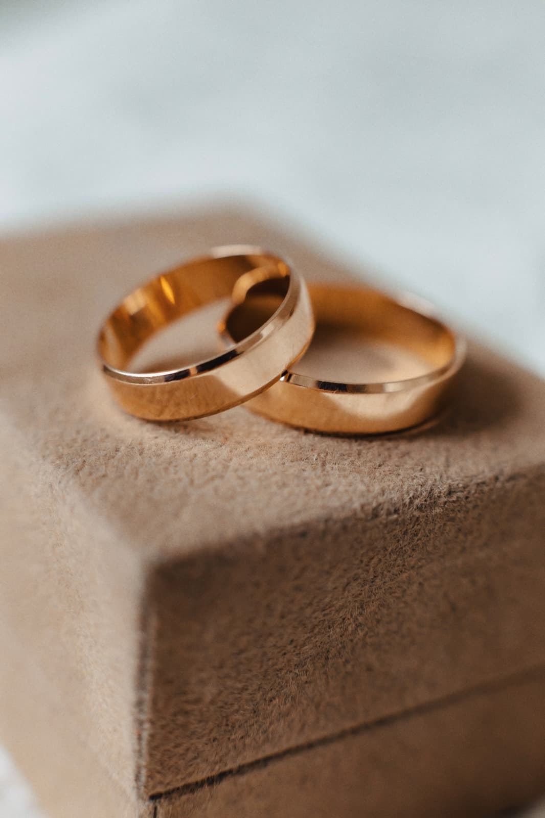 Two interlocking gold wedding bands